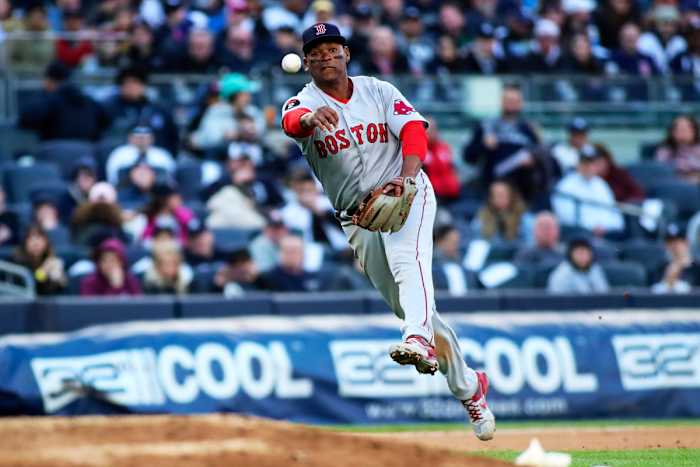Red Sox third baseman Rafael Devers makes a running throw to first base in the seventh inning against the Yankees at Yankee Stadium on April 9, 2022